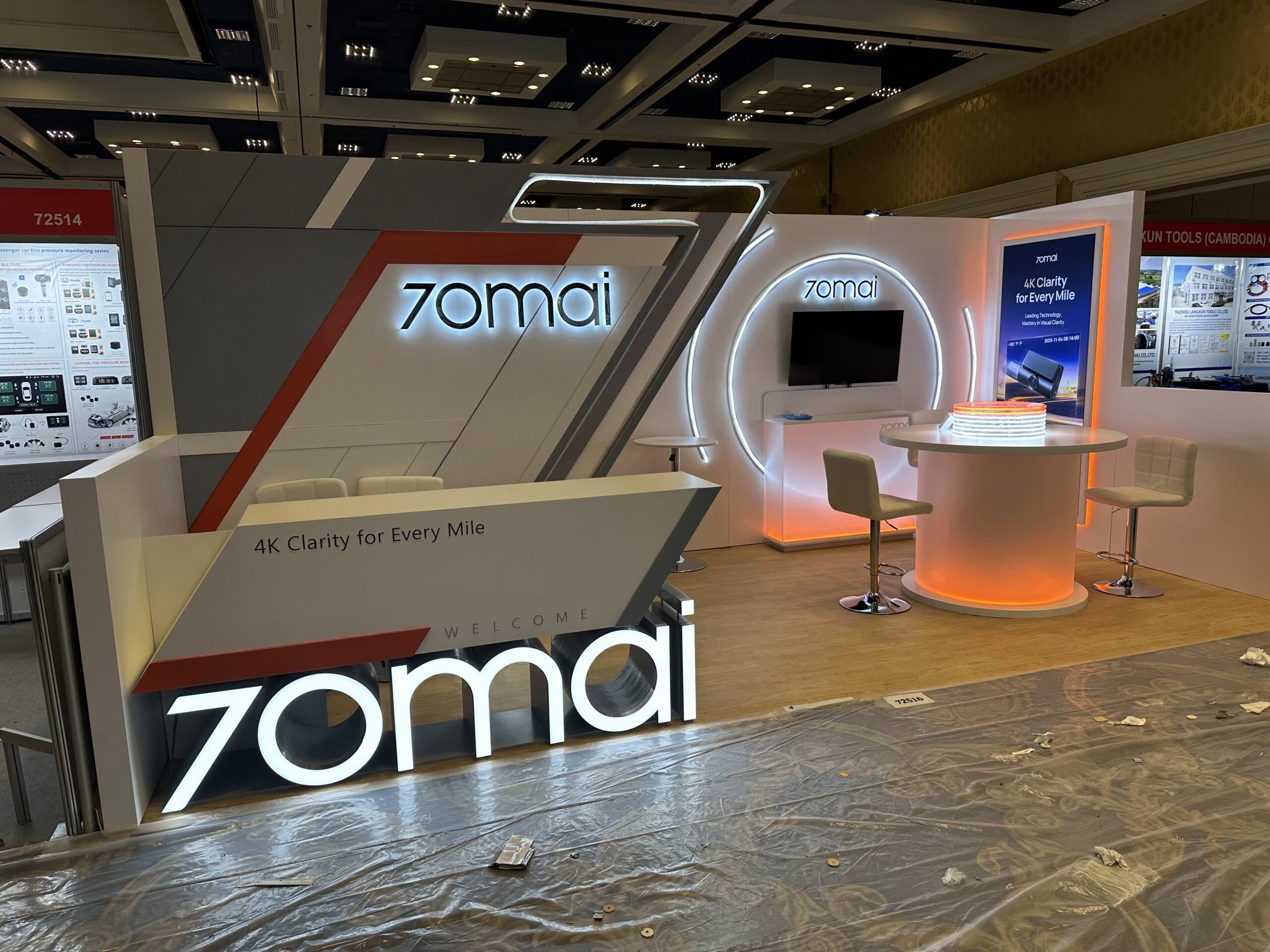 70mai brand wall and circular product display at SEMA 2025