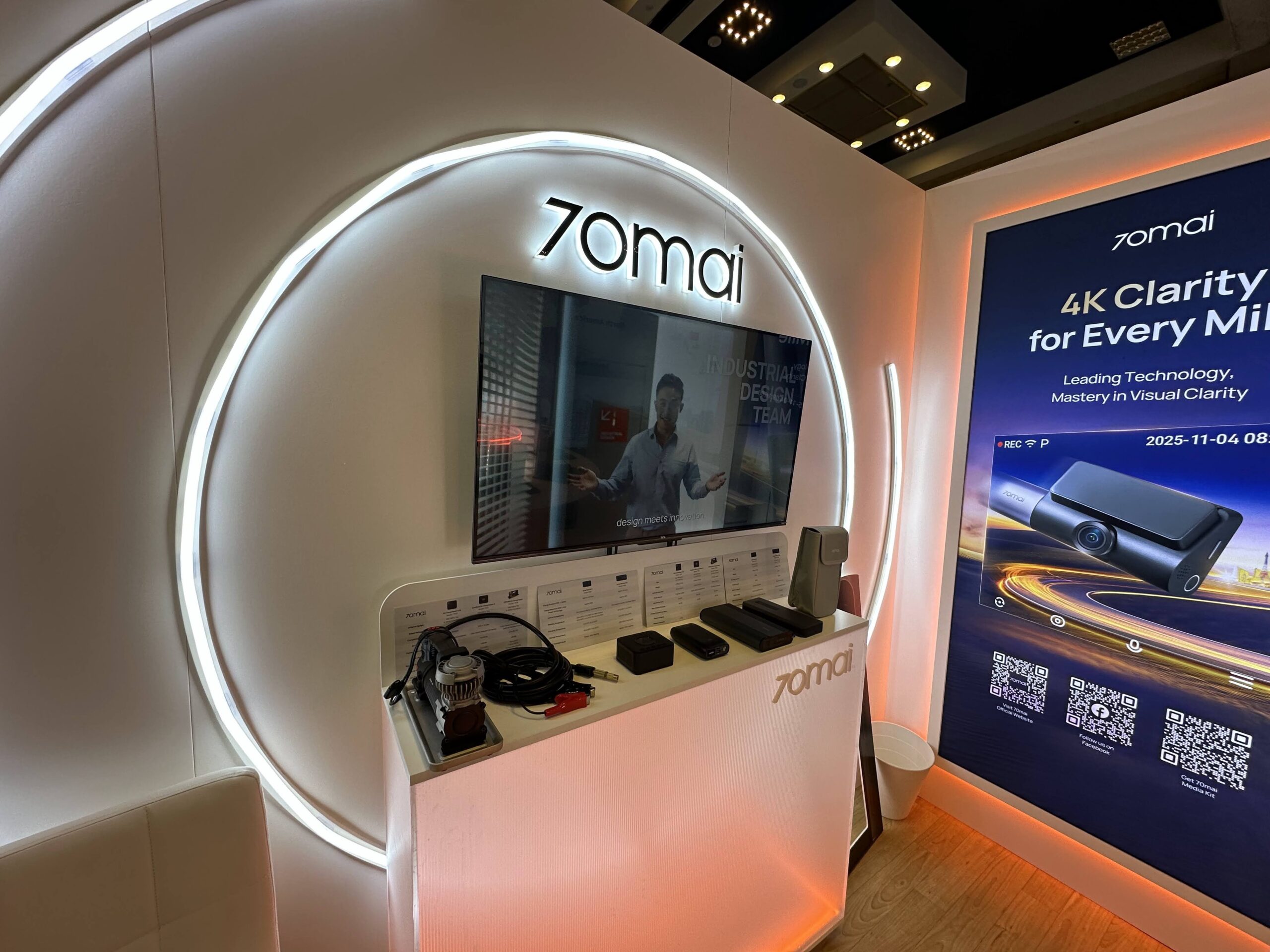 Illuminated 70mai product story wall at SEMA in Las Vegas