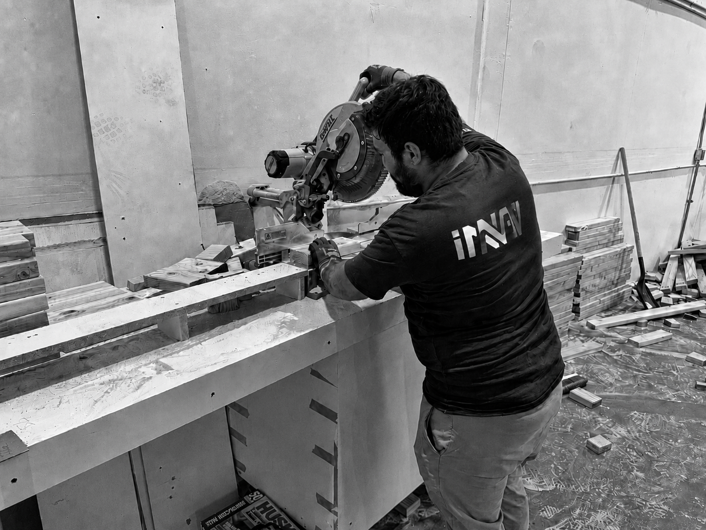 Innovexhibit fabricator cutting custom booth components in a Las Vegas workshop