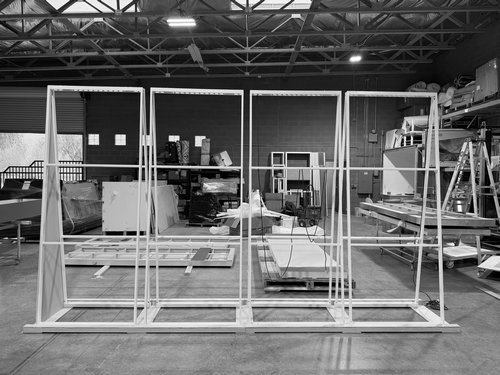 Large aluminum exhibit frame under construction in the workshop